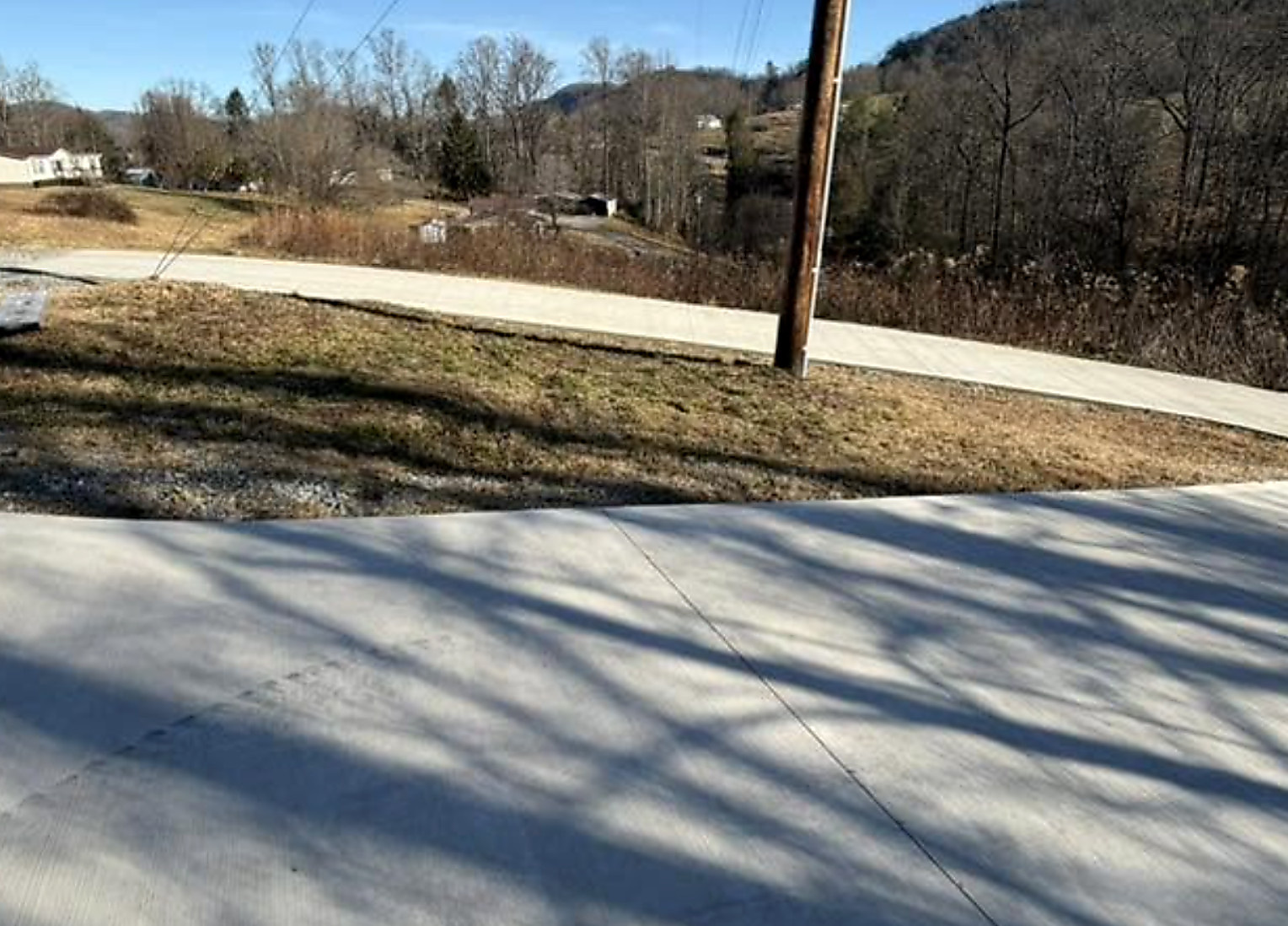 Gravel drive graded and topped